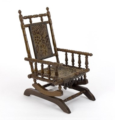 Lot 944 - A child's late 19th Century rocking chair, the...