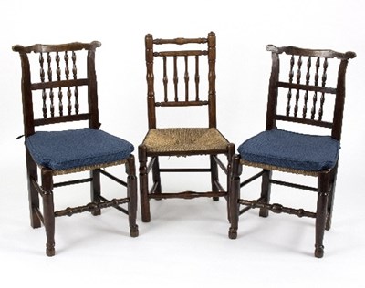 Lot 945 - A pair of 19th Century rush seat spindle back...