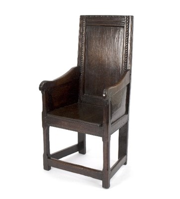 Lot 962 - A 17th Century oak panel back armchair