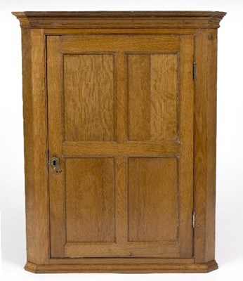 Lot 971 - An early 19th Century oak hanging corner...