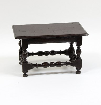 Lot 982 - A rectangular yew wood table with moulded...