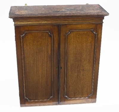 Lot 987 - A mid 19th Century mahogany cupboard fitted...