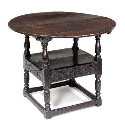 Lot 994 - A monk's 17th Century oak table, the circular...