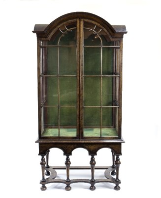 Lot 1015 - A walnut arch top cabinet of late 17th Century...