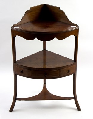 Lot 1016 - A George III mahogany corner washstand, 57cm...