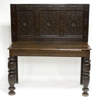 Lot 1041 - A rectangular table with carved back and...