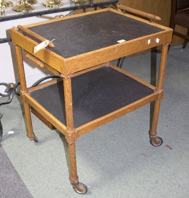 Lot 1054 - An oak two-tier slate based tea trolley,...