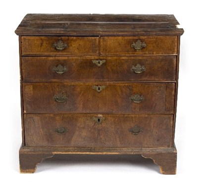 Lot 1063 - An early 18th Century crossbanded chest of two...