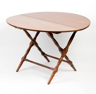 Lot 1080 - A late Victorian coaching table, the folding...