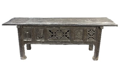 Lot 1086 - A Tudor style oak counter or hutch table, the...