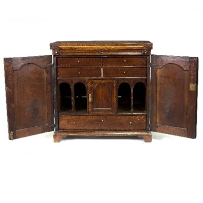 Lot 1095 - A George II walnut side cabinet, the fold-over...