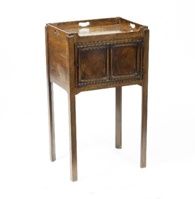 Lot 1097 - A George III mahogany tray-top pot cupboard,...