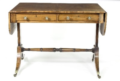 Lot 1105 - A Regency mahogany sofa table, fitted two...