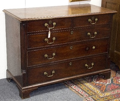 Lot 1106 - A George II mahogany chest of two short over...