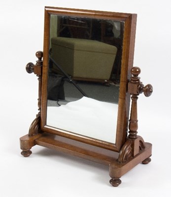 Lot 1117 - A Victorian mahogany swing frame mirror, on...