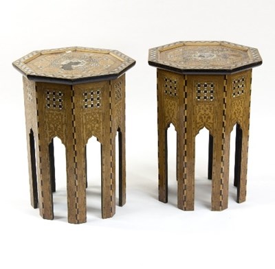 Lot 1123 - A pair of inlaid octagonal tables, each with...