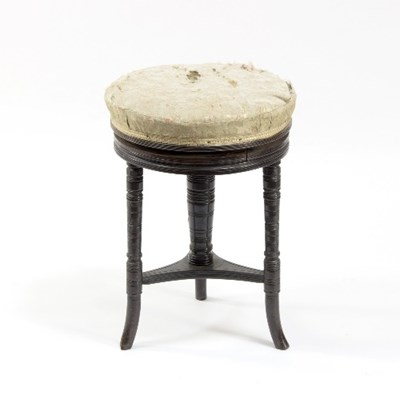 Lot 1124 - A 19th Century circular rosewood piano stool,...