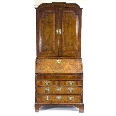 Lot 1139 - A Queen Anne and later walnut bureau bookcase,...