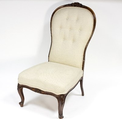 Lot 1140 - A Victorian carved walnut framed nursing chair...