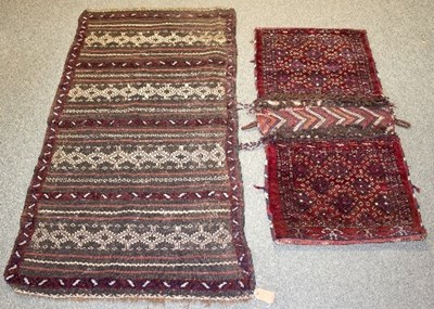 Lot 1199 - An Afghan flatweave mat with bands of...