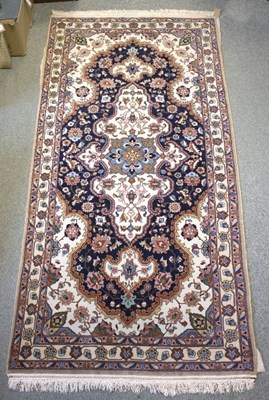 Lot 1201 - An Isfahan rug, the central medallion to an...