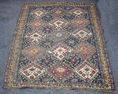 Lot 1214 - A Qashqai rug with diamond medallions within a...