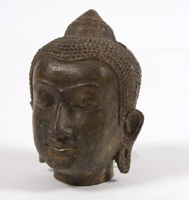 Lot 4 - A bronze head of a Buddha, 12cm high