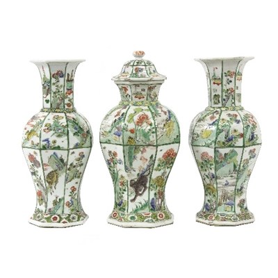 Lot 16 - A garniture of three Chinese vases, Kangxi, of...