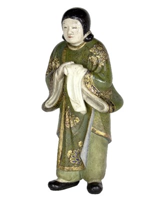 Lot 37 - An Oriental lacquered papier-m?ch?© figure of...