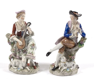 Lot 104 - A pair of Sitzendorf porcelain figures of...