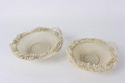 Lot 122 - Two Belleek baskets with foliate decoration,...