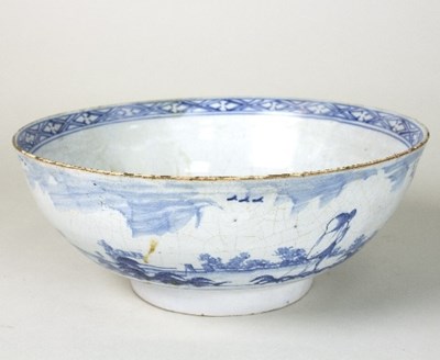 Lot 128 - A Delft blue and white bowl, possibly London,...