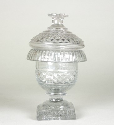 Lot 166 - A small Irish glass lidded jar, cut with...