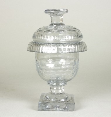 Lot 167 - A small Irish glass lidded jar, honeycomb-type...