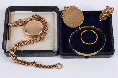 Lot 182 - A 9ct gold medal, 14.6gm, a 9ct gold link...