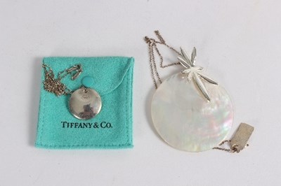 Lot 205 - A Tiffany and Co. Elsa Peretti silver circular...