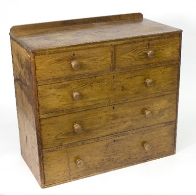 Lot 305 - A pitch pine chest of two short over three...