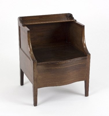 Lot 308 - A mahogany serpentine front commode, with...