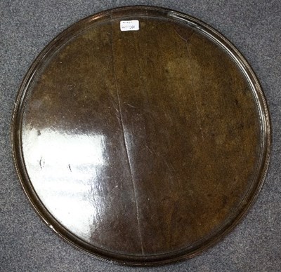 Lot 317 - A circular mahogany table top with moulded...