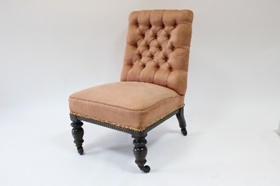 Lot 342 - A late Victorian upholstered chair with button...