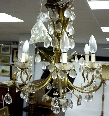 Lot 345 - A gilt metal and cut glass chandelier, 70cm...