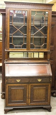 Lot 349 - An Edwardian mahogany bureau bookcase, the...