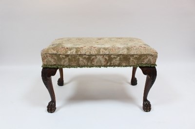 Lot 363 - A George II style stool with upholstered seat...