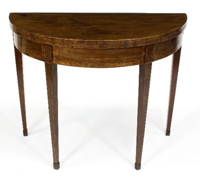 Lot 369 - A Georgian D-shaped card table with...