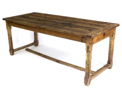 Lot 375 - A pine refectory table, the planked top on...