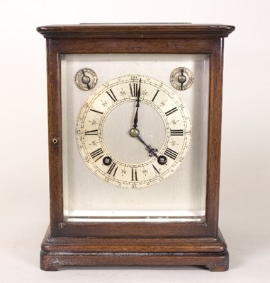 Lot 382 - An oak cased four-glass eight-day mantel clock...