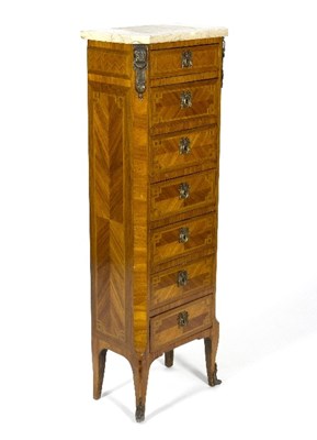 Lot 390 - A French Empire chest of seven drawers, with...