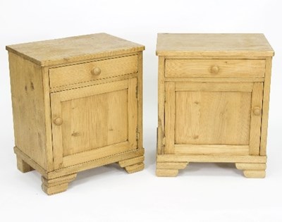 Lot 395 - A pair of pine bedside tables, each fitted a...