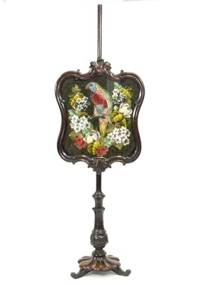 Lot 399 - An early Victorian pole screen, the screen...