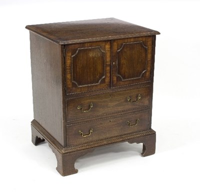 Lot 400 - A George III mahogany pot cupboard fitted a...